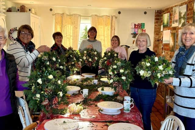 Members of Stokes Bay WI enjoying a wreath making workshop.