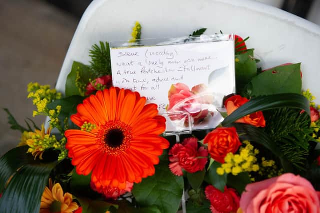 Floral tributes for Steve Woods at AFC Portchester. Picture: Habibur Rahman