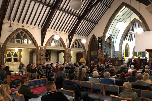 Residents listen to Cllr Bosher at a meeting on crime in the Drayton and Farlington area.
