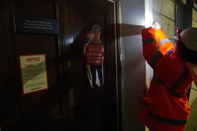 Greenpeace activists shut down Barclays branches in Leicester on March 2. Picture: Chris Mackins/Greenpeace