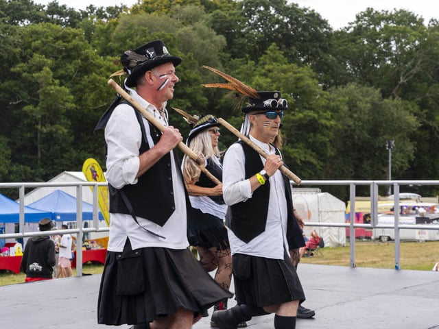 A group Morris Dancers show off their skills at Wickham Festival 2024.