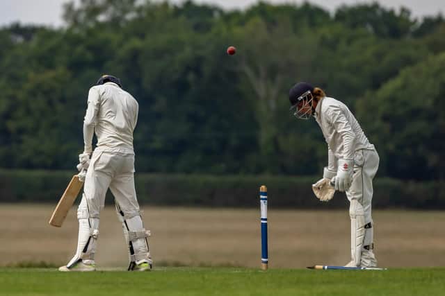 Hambledon's Henry Glanfield  is bowled by Archie Reynolds. Picture: Mike Cooter
