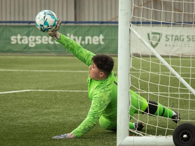 US Portsmouth keeper Harrison Hart saves a Locks Heath penalty. Picture: Keith Woodland (260221-1046)