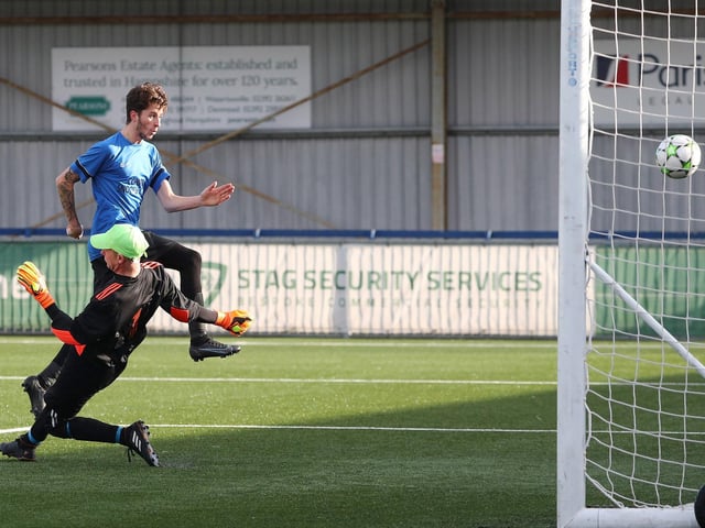 Eastney's Harry Ainsley scores his side's fourth goal. Picture: Stuart Martin