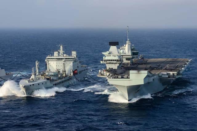 RFA Tidespring returns from the carrier strike group deployment. Here she is pictured with HMS Queen Elizabeth, which is now on her way home to Portsmouth,