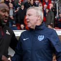 Portsmouth Manager Kenny Jackett and Doncaster Rovers Manager Darren Moore shake hands before the Sky Bet League One match between Doncaster Rovers and Portsmouth at Keepmoat Stadium on October 5th 2019 in Doncaster, England. (Photo by Daniel Chesterton/PinPep)