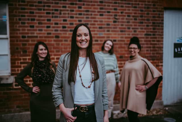 Pictured: Natalie Evans, Founding Director (centre) with the Little Barn Door team