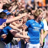 Todd Cantwell celebrates with Rangers fans after scoring against Celtic in May. Pompey had hoped to bring Rangers to Fratton Park in July as part of their 125th Anniversary celebrations. Picture: Ian MacNicol/Getty Images)