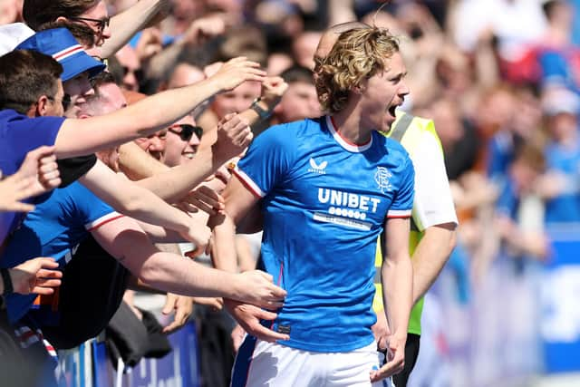 Todd Cantwell celebrates with Rangers fans after scoring against Celtic in May. Pompey had hoped to bring Rangers to Fratton Park in July as part of their 125th Anniversary celebrations. Picture: Ian MacNicol/Getty Images)