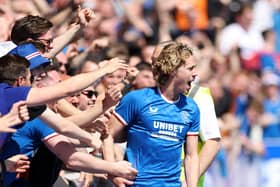 Todd Cantwell celebrates with Rangers fans after scoring against Celtic in May. Pompey had hoped to bring Rangers to Fratton Park in July as part of their 125th Anniversary celebrations. Picture: Ian MacNicol/Getty Images)