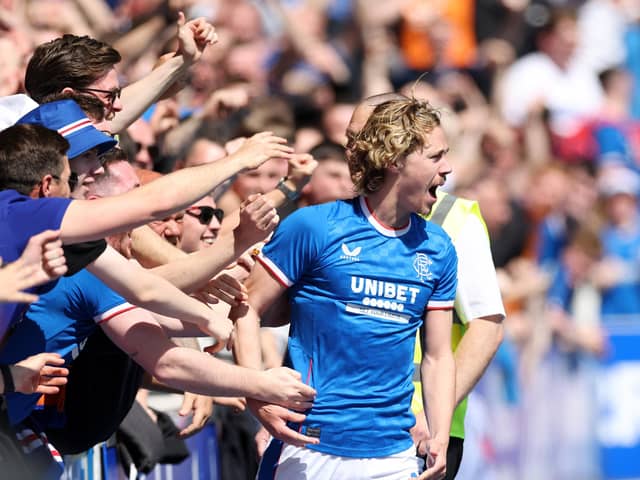 Todd Cantwell celebrates with Rangers fans after scoring against Celtic in May. Pompey had hoped to bring Rangers to Fratton Park in July as part of their 125th Anniversary celebrations. Picture: Ian MacNicol/Getty Images)