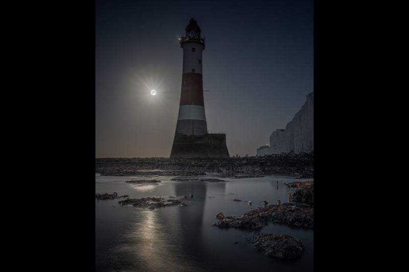 Full moon behind Beachy Head lighthouse by Giles Embleton Smith
