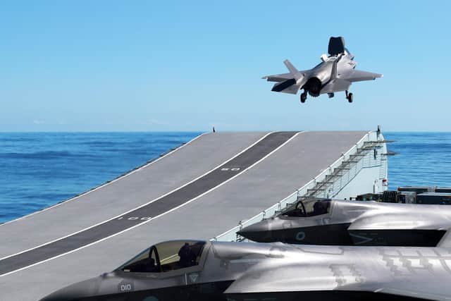 One of four operational F-35B Lightning Jets taking off from HMS Queen Elizabeth