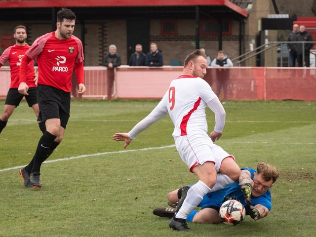Fareham goalkeeper Luke Deacon saves from the feet of Connor Duffin. Picture: Keith Woodland