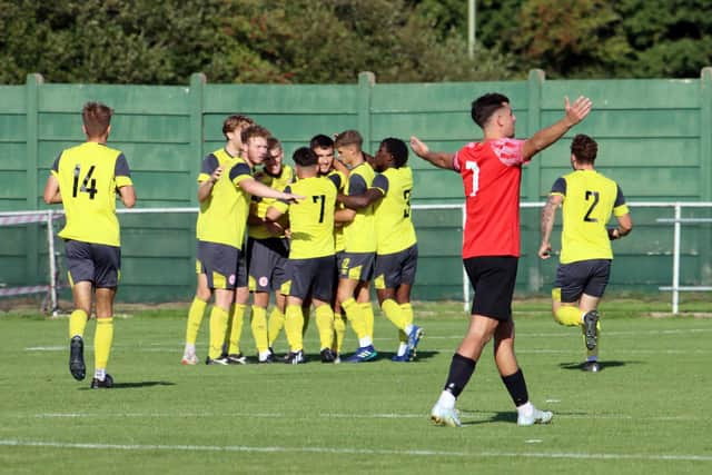 A frustrated Charlie Cooper reacts as Bournemouth Poppies celebrate another goal at Cams Alders. Picture by Ken Walker