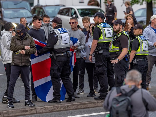 The M275 is brought to a standstill by Anti-immigration protesters. Picture: Mike Cooter (070824)
