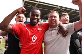 Gavin Massey celebrates Wigan's promotion back to the Championship with Latics fans.  Picture: Tattersall/Getty Images