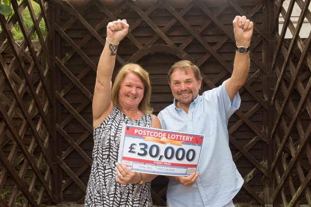 Viv Hayward alongside her husband Richard, of Lancaster Close, Portchester, after winning £30,000 in the People's Postcode Lottery.