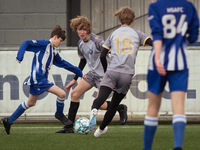 Action from the U15 Campbell McFaull Invitation Cup final between Hayling St Andrews Blue and Hayling St Andrew White. Picture: Keith Woodland (260221-137)