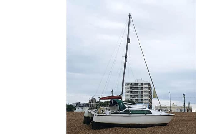 Boat washed up on the beach after the storm resting by South Parade Pier at SouthseaSent in by Mickie Bailey