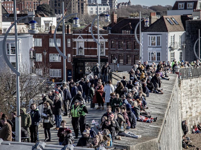 Crowds gathering at The Round Tower, Old Portsmouth, to see HMS Prince of Wales.
