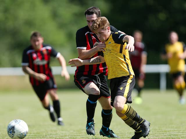 Callum Dart (yellow) could be recalled by Baffins Milton Rovers from  his spell at Fleetlands.
Picture: Chris Moorhouse