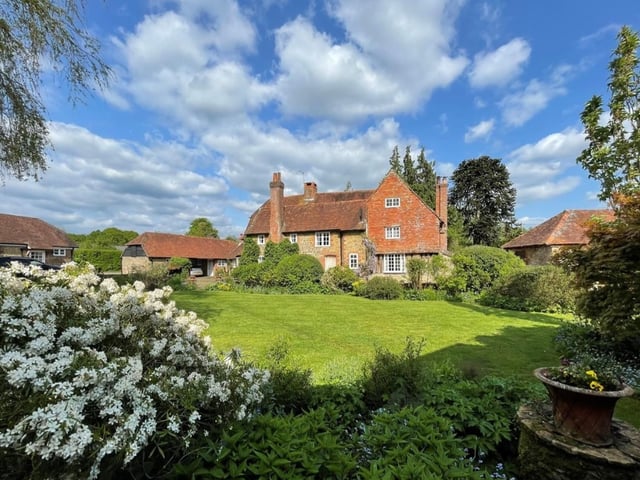 This Grade II* listed Elizabethan farm is situated in 14.5 acres and it comes with five bedrooms, three bathrooms and six reception rooms.