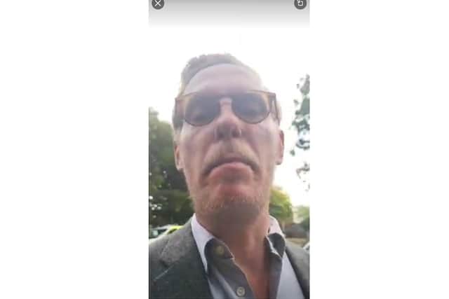 Screengrab from a Twitter video by Laurence Fox, of Fox as he calls Hampshire Police officers 'brown shirts' as a man identified as 'Harry Miller' is arrested for allegedly causing offence due to sharing a social media post of Progress Pride flags shaped into a Swastika