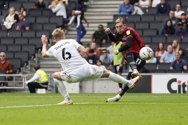 Substitute Ronan Curtis fires in a shot during Pompey's 1-0 defeat to MK Dons this afternoon. Picture: Jason Brown/ProSportsImages