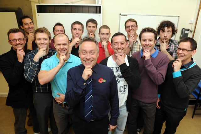 Flying Bull Primary Staff taking part in Movember, growing their moustaches for charity. Front centre is headteacher Deamonn Hewett-Dale, organiser of the event. Picture: Paul Jacobs (113959-1)