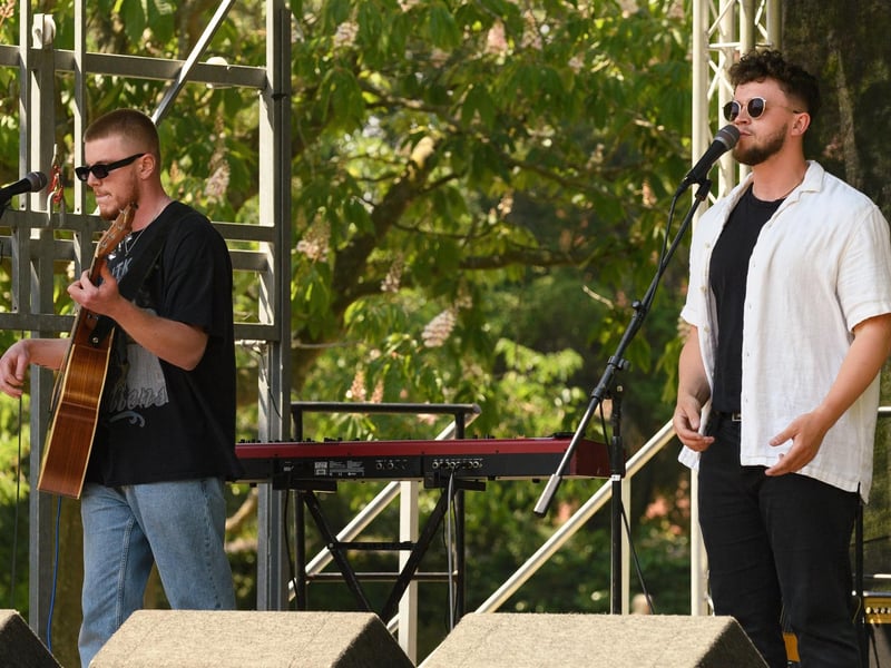 Pictured is: BLVCK Violet playing an acoustic set at the Victoria Park Bandstand.