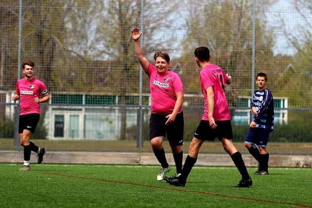 AFC Trades celebrate one of their 23 goals against AFC Eastney. Picture: Tom Phillips