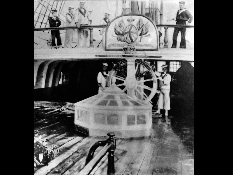 Poopdeck and binnacle, HMS Victory. Seen on Trafalgar Day pre-First World War we see the crew of the Victory when still at anchor in Portsmouth Harbour.