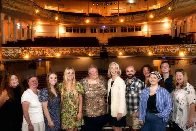 Chair of the New Theatre Royal, Portsmouth, Angela Parks (fifth from left), with CEO Dr Anna Farthing (sixth from left) with the venue's staff. Picture by Sheila Burnett