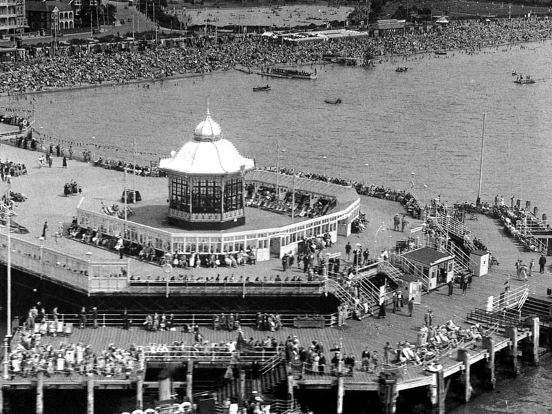 South Parade Pier, Southsea, with packed beaches in the background in the 1930's