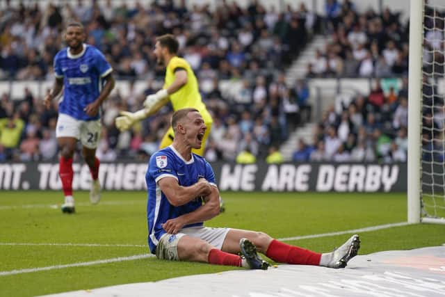 Colby Bishop celebrates his Pompey goal at Derby County. Pic: Jason Brown.