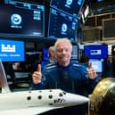 Richard Branson, Founder of Virgin Galactic poses before ringing the First Trade Bell to commemorate the company's first day of trading on the New York Stock Exchange (NYSE) on October 28, 2019 in New York City. (Photo by Johannes EISELE / AFP) (Photo by JOHANNES EISELE/AFP via Getty Images)