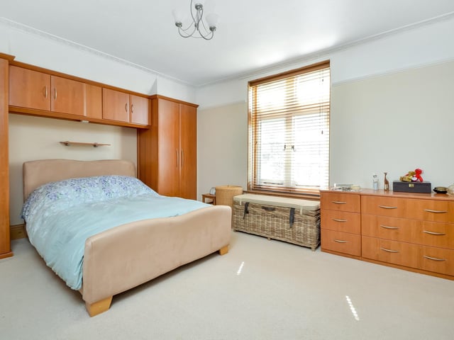 One of the spacious bedrooms