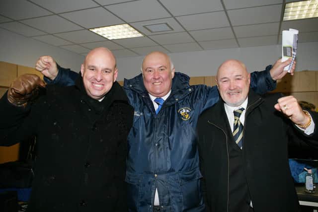 Hawks chairman Marcus Hackney, secretary Trevor Brock and Director of Football Derek Pope celebrate Hawks' 1-1 FA Cup third round draw at Swansea in January 2009.
Picture: Robin Jones, Digital South.