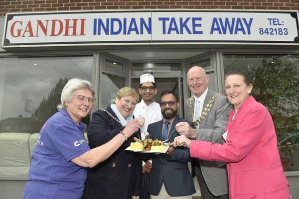 Gandhi Indian takeaway in Anjou Crescent, Fareham, held a charity fundraising evening on Monday. From left, volunteer event chair for Cancer Research UK relay for life Portsmouth Jayne Bowater, Mayoress of Fareham Anne Ford, Pinak Deb, Gandhi owner Abu-Suyeb Tanzam, Mayor of Fareham Mike Ford and Cllr Tina Ellis for Fareham West ward Picture: Sarah Standing (250423-2430)