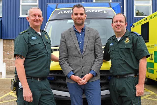 SCAS Technical Team Leader Dave Gardiner with (right) SCAS Emergency Care Assistant Chris Adoo who responded to an emergency call when Jamie collapsed just 400 metres from the Finish Line of the 2018 Great South Run on Southsea seafront
Picture: Malcolm Wells (190610-2162)
