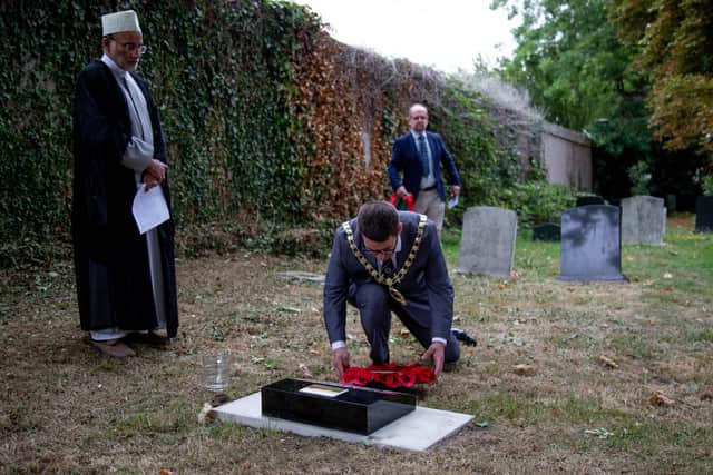 Deputy Lord Mayor, Tom Coles laying the first wreath on the headstone of  Ibrahim Hussain at Kingston Cemetry

Picture: Habibur Rahman