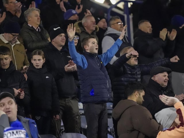 Pompey fans backed their team to a crucial Championship survival win over Cardiff last night.