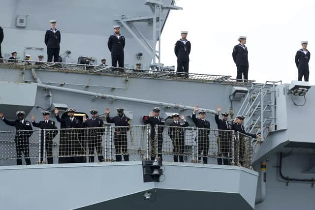 Pictured: Ships company line up the flight deck for Procedure Alpha as HMS Prince of Wales set sail for Westlant 22 deployment. Picture: LPhot Unaisi Luke/MoD Crown Copyright.