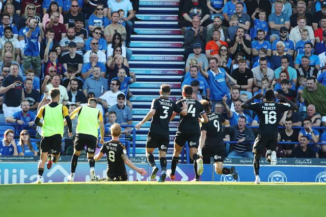 Cambridge celebrate their second goal