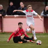 Horndean's Zack Willett (white) has now scored 17 goals in his last nine Wessex Premier starts. Picture: Keith Woodland