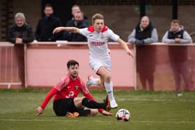 Horndean's Zack Willett (white) has now scored 17 goals in his last nine Wessex Premier starts. Picture: Keith Woodland