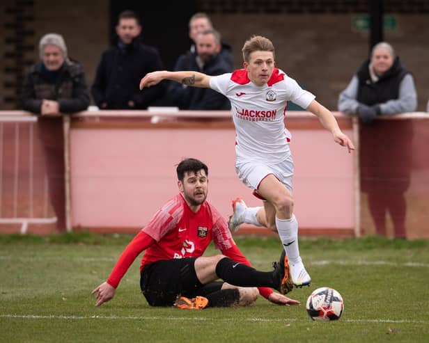 Horndean's Zack Willett (white) has now scored 17 goals in his last nine Wessex Premier starts. Picture: Keith Woodland