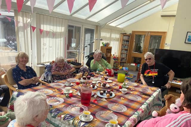 Residents gather around for a teddy bear-themed morning at Bedhampton Court.