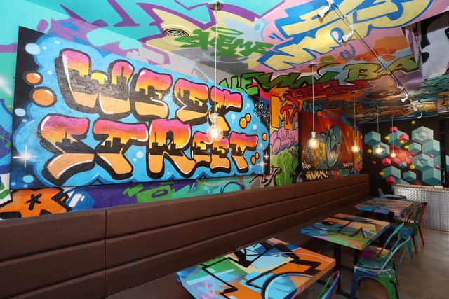 Art on the walls of Bangerz 'n' Burgerz. Picture: Stuart Martin (220421-7042)